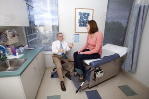 woman talking to doctor