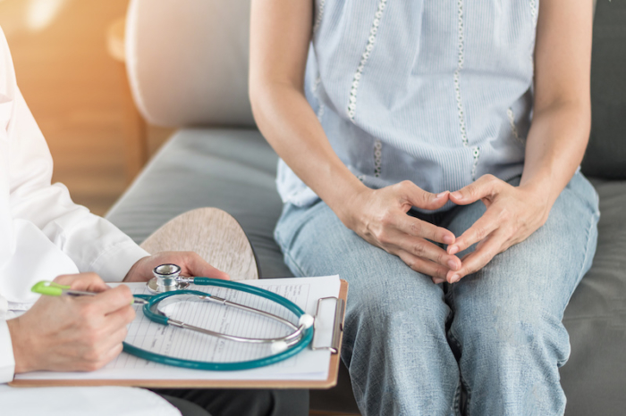 Doctor or psychiatrist consulting and diagnostic examining stressful woman patient on obstetric - gynecological female illness, or mental health in medical clinic or hospital healthcare service center; Blog: Things You Didn’t Know Your OB/GYN Could Help You With